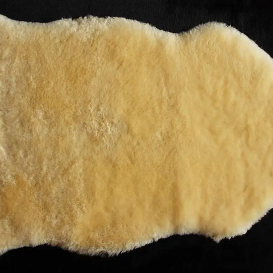 Baby-Lammfell medizinisch als Kinderwageneinlage