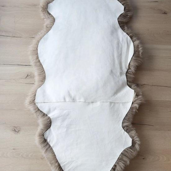 1,5er Lammfell Taupe (grau braun)