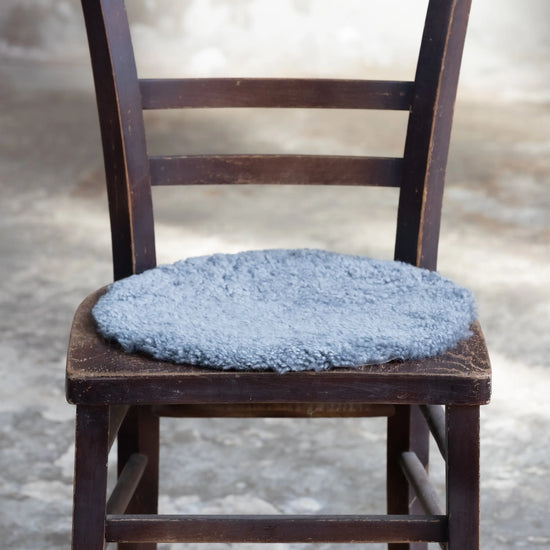 Lammfell Sitzauflage Curly Rund Grau