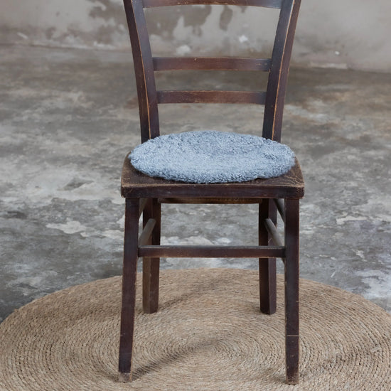 Lammfell Sitzauflage Curly Rund Grau