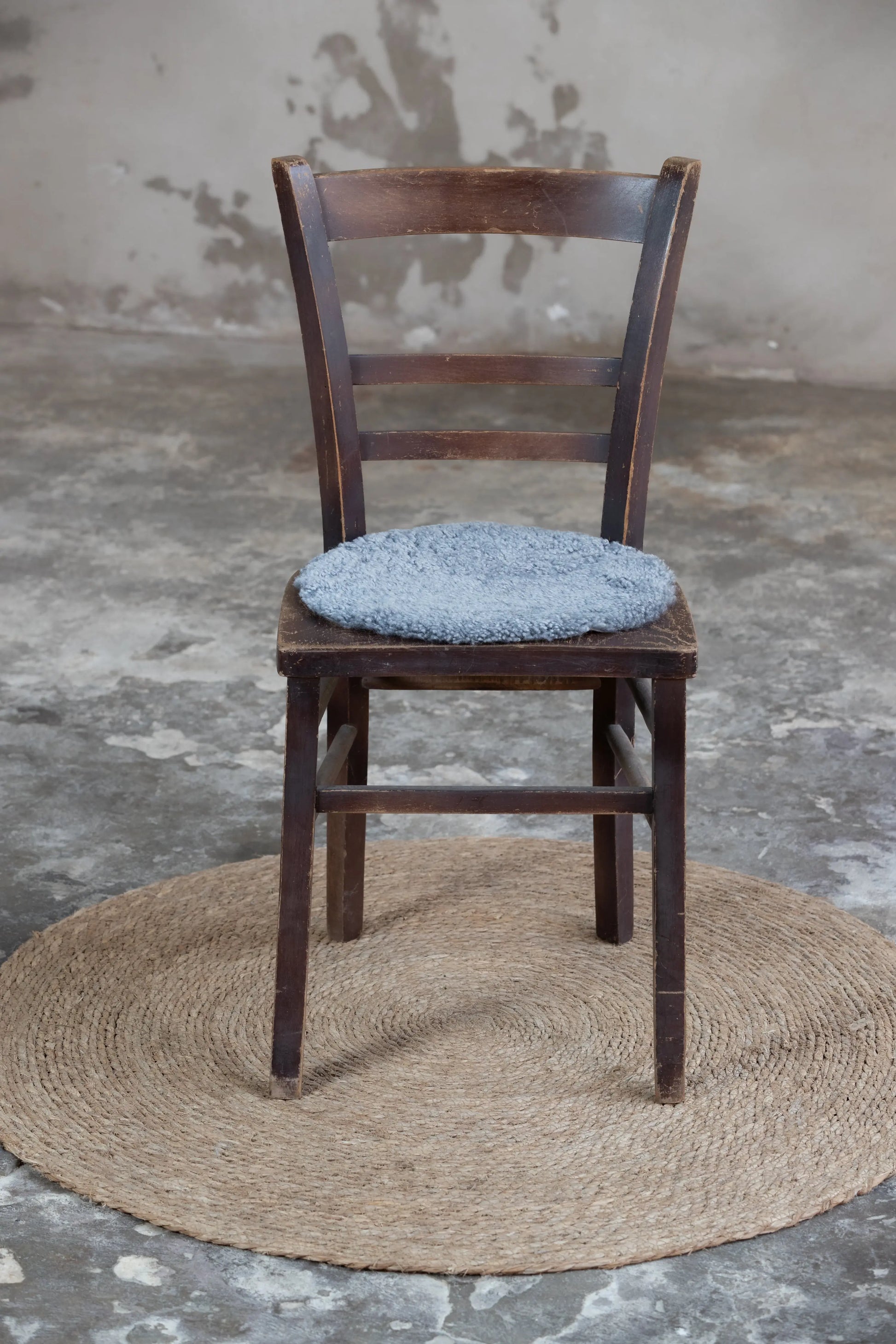 Lammfell Sitzauflage Curly Rund Grau